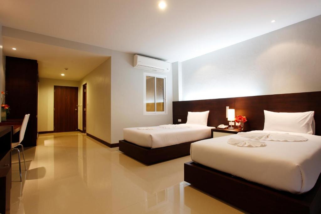 Nize Hotel - Sha Plus Phuket Quarto foto